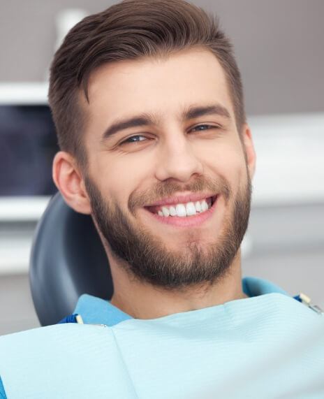 Man smiling during preventive dentistry visit