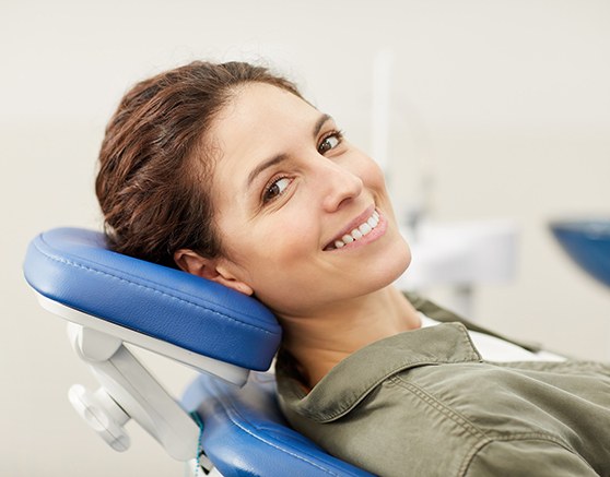 Woman in dental chair for cleaning