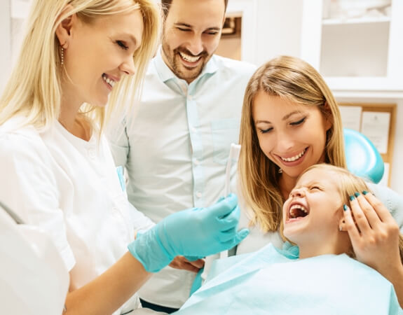 Child laughing after pulp therapy