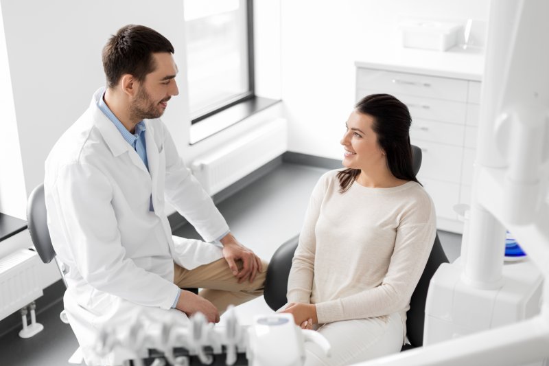 patient getting dental checkup and cleaning 